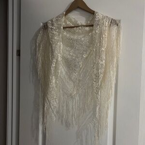 Delicate crocheted shawl